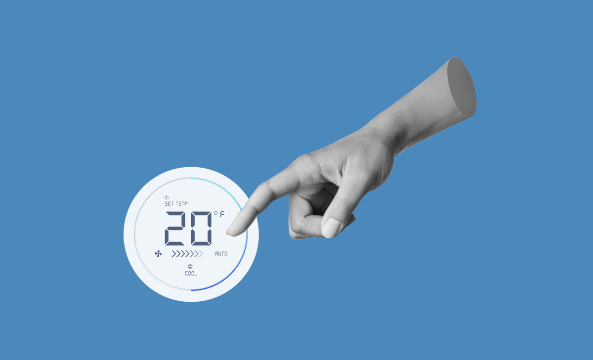 Digital image of a finger pointing at a thermostat's temperature display.